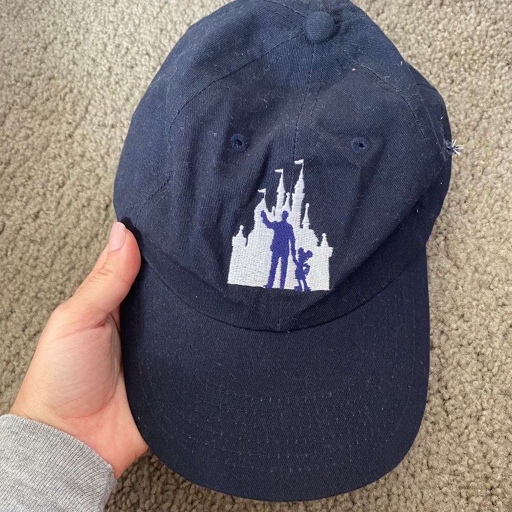 Disney parks partner statue hat